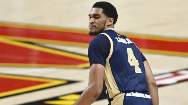 Nov 11, 2021; College Park, Maryland, USA; George Washington Colonials forward Ricky Lindo Jr. (4)reacts after making basket during the game against the Maryland Terrapins at Xfinity Center. Mandatory Credit: Tommy Gilligan-USA TODAY Sports