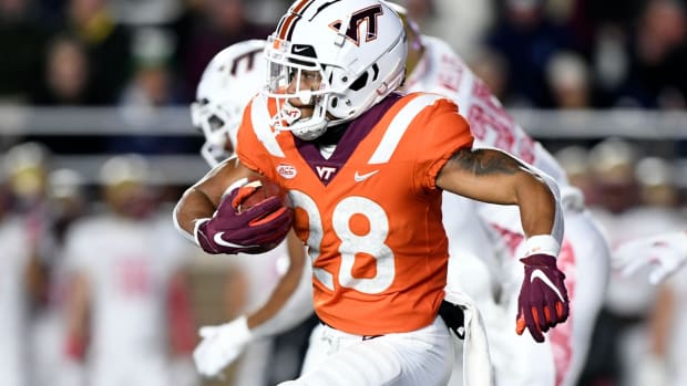 Nov 5, 2021; Chestnut Hill, Massachusetts, USA; Virginia Tech Hokies running back Chance Black (28) returns a ball against the Boston College Eagles during the first half at Alumni Stadium. Mandatory Credit: Brian Fluharty-USA TODAY Sports
