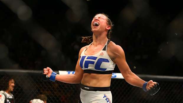 March 5, 2016; Las Vegas, NV, USA; Miesha Tate celebrates her victory by submission against Holly Holm (not pictured) during UFC 196 at MGM Grand Garden Arena.