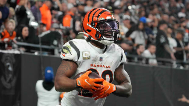 Nov 21, 2021; Paradise, Nevada, USA; Cincinnati Bengals running back Joe Mixon (28) celebrates after scoring on a 20-yard touchdown run against the Las Vegas Raiders in the second half at Allegiant Stadium. Mandatory Credit: Kirby Lee-USA TODAY Sports