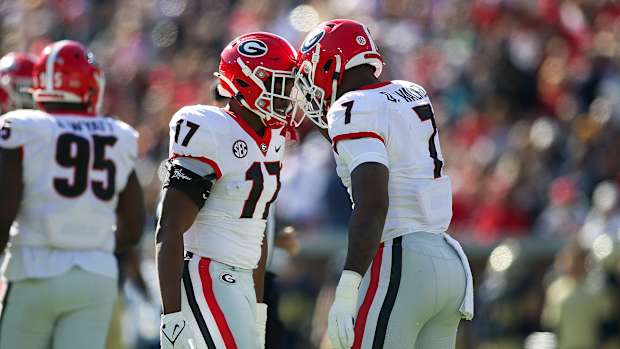 Georgia's Nakobe Dean and Quay Walker celebrate