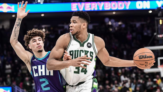 Milwaukee Bucks forward Giannis Antetokounmpo (34) drives for the basket against Charlotte Hornets guard LaMelo Ball