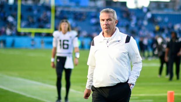 Urban Meyer walks off the field after a Jaguars loss