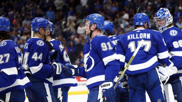 Dec 16, 2021; Tampa, Florida, USA; Tampa Bay Lightning center Steven Stamkos (91) celebrates with teammates after defeating the Ottawa Senators at Amalie Arena. Mandatory Credit: Kim Klement-USA TODAY Sports