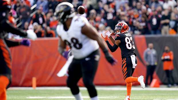 Cincinnati Bengals wide receiver Tyler Boyd (83) catches a touchdown pass in the second quarter during a Week 16 NFL game against the Baltimore Ravens, Sunday, Dec. 26, 2021, at Paul Brown Stadium in Cincinnati.

Baltimore Ravens At Cincinnati Bengals Dec 26