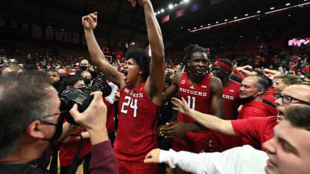 Dec 9, 2021; Piscataway, New Jersey, USA; Rutgers Scarlet Knights guard Ron Harper Jr. (24) celebrates with Rutgers Scarlet Knights center Clifford Omoruyi (11) after defeating the top ranked Purdue Boilermakers 70-69 at Jersey Mike's Arena. Mandatory Credit: Catalina Fragoso-USA TODAY Sports
