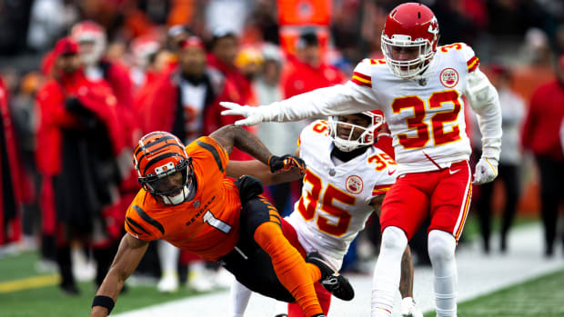 Cincinnati Bengals wide receiver Ja'Marr Chase (1) is forced out of bounds in the red zone by Kansas City Chiefs cornerback Charvarius Ward (35) as Kansas City Chiefs free safety Tyrann Mathieu (32) helps in the second half of the NFL game on Sunday, Jan. 2, 2022, at Paul Brown Stadium in Cincinnati. Cincinnati Bengals defeated Kansas City Chiefs 34-31. © Albert Cesare / The Enquirer / USA TODAY NETWORK