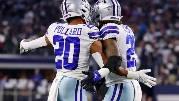 Sep 27, 2021; Arlington, Texas, USA; Dallas Cowboys running back Tony Pollard (left) and running back Ezekiel Elliott (21) react after a play against the Philadelphia Eagles during the first quarter at AT&amp;T Stadium. Mandatory Credit: Kevin Jairaj-USA TODAY Sports