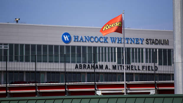 Jan 26, 2021; Mobile, Alabama, USA; Reese s flags fly above Hancock Whitney Stadium for Senior Bowl week. The first day s practices were moved indoors with no media access due to weather concerns.