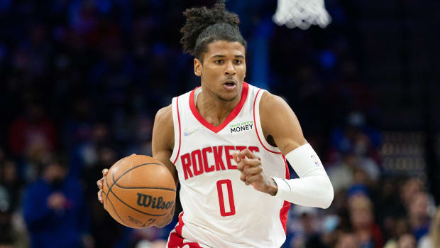 Houston Rockets guard Jalen Green (0) dribbles the ball against the Philadelphia 76ers.