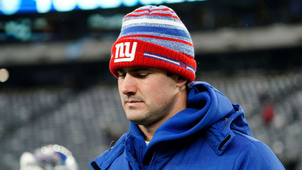 New York Giants quarterback Daniel Jones walks off the field after the Giants fall to the Washington Football Team, 22-7, at MetLife Stadium on Sunday, Jan. 9, 2022.