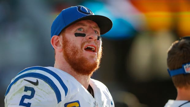 Indianapolis Colts quarterback Carson Wentz (2) looks to the scoreboard late in the fourth quarter of the game on Sunday, Jan. 9, 2022, at TIAA Bank Field in Jacksonville, Fla. The Colts lost to the Jaguars, 11-26. The Indianapolis Colts Versus Jacksonville Jaguars On Sunday Jan 9 2022 Tiaa Bank Field In Jacksonville Fla