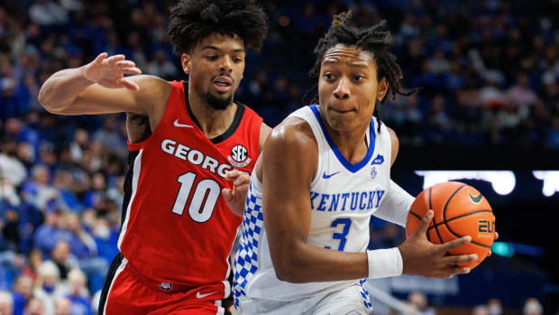 Jan 8, 2022; Lexington, Kentucky, USA; Kentucky Wildcats guard TyTy Washington Jr. (3) drives to the basket against Georgia Bulldogs guard Aaron Cook (10) during the second half at Rupp Arena at Central Bank Center. Mandatory Credit: Jordan Prather-USA TODAY Sports
