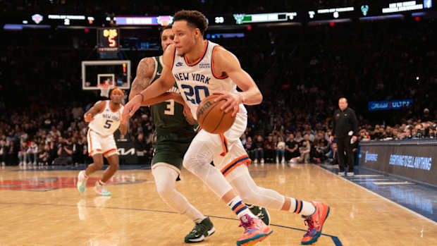 Knicks forward Kevin Knox drives against Bucks.