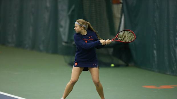 Polina Kozyreva hits a backhand against Army
