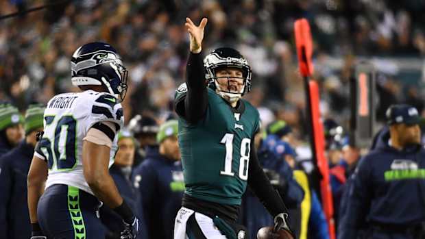 Eagles quarterback Josh McCown gestures after play.