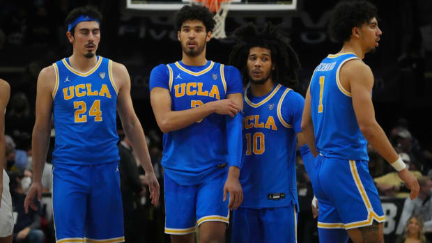 Jan 22, 2022; Boulder, Colorado, USA; UCLA Bruins guard Jaime Jaquez Jr. (24) and guard Johnny Juzang (3) and guard Tyger Campbell (10) and guard Jules Bernard (1) react during the second half against the Colorado Buffaloes at the CU Events Center. Mandatory Credit: Ron Chenoy-USA TODAY Sports