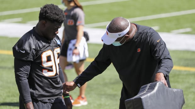 May 14, 2021; Cincinnati, Ohio, USA; Cincinnati Bengals defensive line coach Marion Hobby directs defensive end Cam Sample (96) during NFL minicamp at Paul Brown Stadium. Mandatory Credit: Katie Stratman-USA TODAY Sports