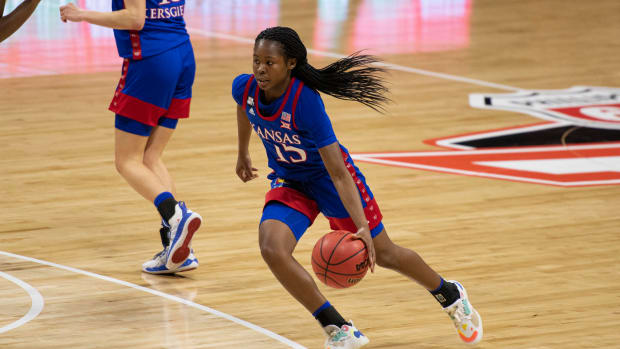 Mar 11, 2021; MO, Kansas City, USA; Kansas Jayhawks guard Zakiyah Franklin (15) drives with the ball against the TCU Horned Frogs in the second half at Municipal Auditorium. Mandatory Credit: Amy Kontras-USA TODAY Sports