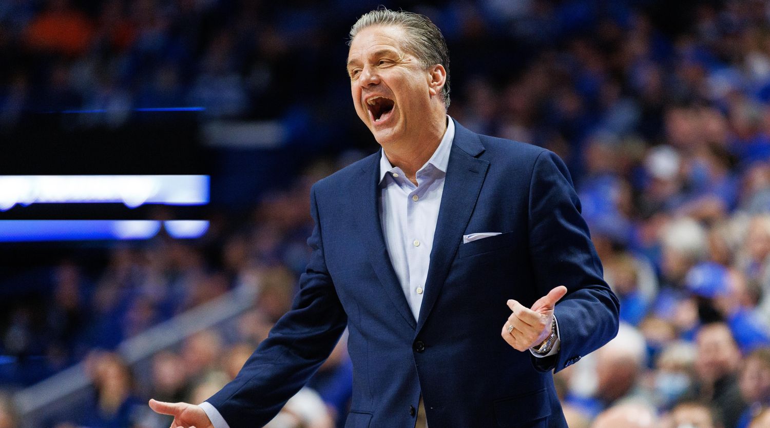 Kentucky coach John Calipari laughs during a game.