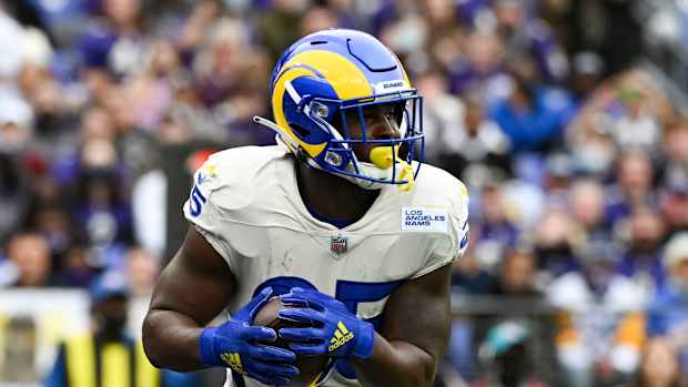 Jan 2, 2022; Baltimore, Maryland, USA; Los Angeles Rams running back Sony Michel (25) rushes during the first half against the Baltimore Ravens at M&T Bank Stadium. Mandatory Credit: Tommy Gilligan-USA TODAY Sports