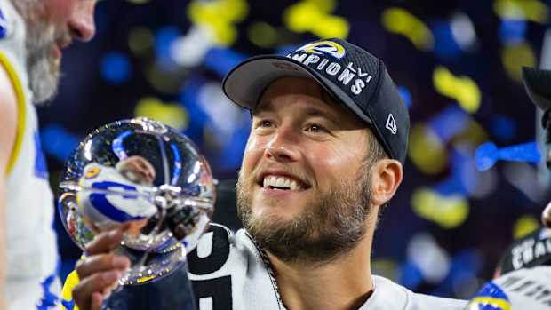 Feb 13, 2022; Inglewood, CA, USA; Los Angeles Rams quarterback Matthew Stafford celebrates with the Lombardi Trophy after defeating the Cincinnati Bengals in Super Bowl LVI at SoFi Stadium. Mandatory Credit: Mark J. Rebilas-USA TODAY Sports