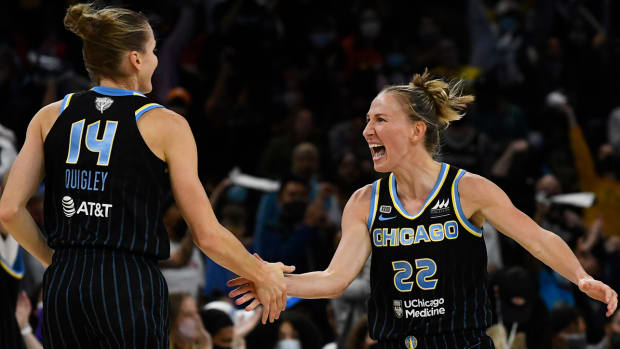Sky guards Allie Quigley (14) and Courtney Vandersloot (22).