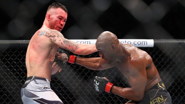 Nov 6, 2021; New York, NY, USA; Kamaru Usman (red gloves) competes against Colby Covington (blue gloves) during UFC 268 at Madison Square Garden.