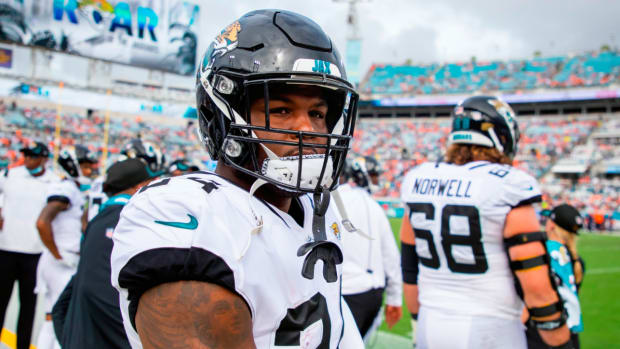 Sep 19, 2021; Jacksonville, Florida, USA; Jacksonville Jaguars running back Carlos Hyde (24) against the Denver Broncos at TIAA Bank Field.