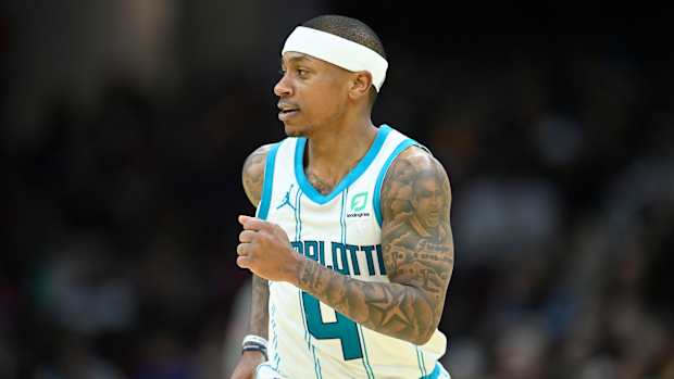 Thomas runs down the court for the Hornets.
