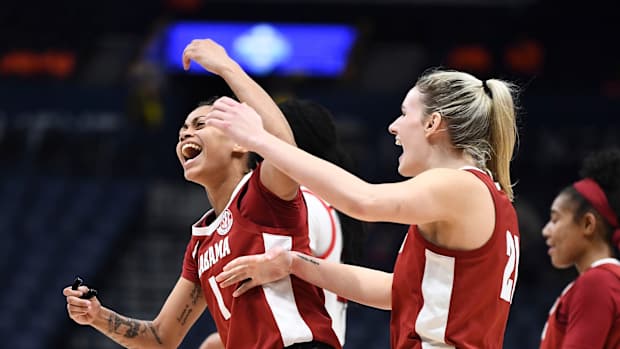 Alabama guard Megan Abrams (1) and Alabama forward Allie Craig Cruce (21) celebrate their win in the SEC Women's Basketball Tournament game against Alabama in Nashville, Tenn. on Thursday, March 3, 2022.