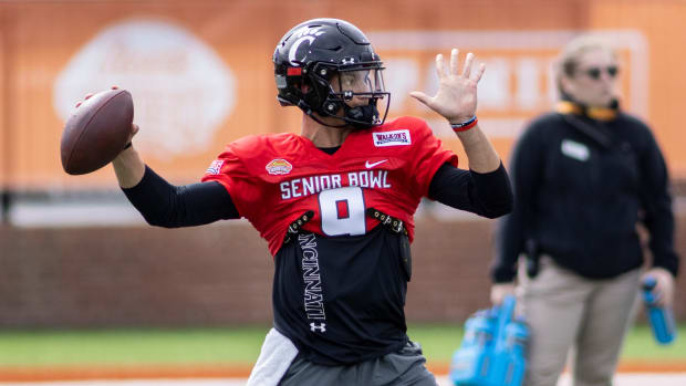 Feb 1, 2022; Mobile, AL, USA; National quarterback Desmond Ridder of Cincinnati (9) throws during National practice for the 2022 Senior Bowl at Hancock Whitney Stadium. Mandatory Credit: Vasha Hunt-USA TODAY Sports