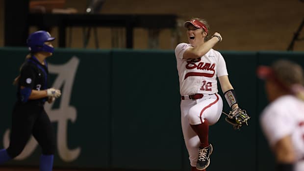 Kaylee Tow celebrates an out