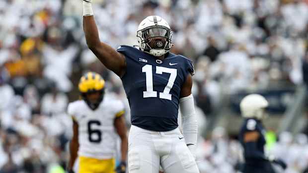 Nov 13, 2021; University Park, Pennsylvania, USA; Penn State Nittany Lions defensive end Arnold Ebiketie (17) reacts follow a sack on Michigan Wolverines quarterback Cade McNamara (12) (not pictured) during the second quarter at Beaver Stadium. Mandatory Credit: Matthew OHaren-USA TODAY Sports