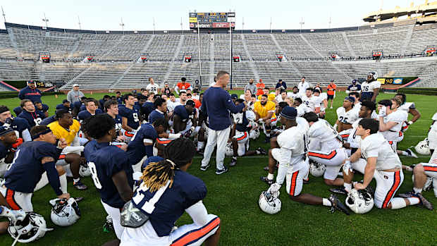 Coach Bryan Harsin talks to his team after practice in Jordan Hare Stadium.Auburn AU scrimmage on Friday, March 25, 2022 in Auburn, Ala.