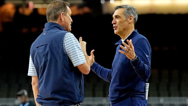 Apr 1, 2022; New Orleans, LA, USA; Villanova Wildcats head coach Jay Wright speaks with CBS announcer Jim Nantz during the Final Four practice at Caesars Superdome. Mandatory Credit: Robert Deutsch-USA TODAY Sports