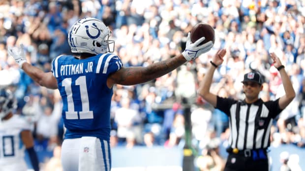 Indianapolis Colts wide receiver Michael Pittman (11) signals to the crowd after making a catch in the end zone for the Colts' first touchdown Sunday, Oct. 31, 2021, during a game against the Tennessee Titans at Lucas Oil Stadium in Indianapolis.