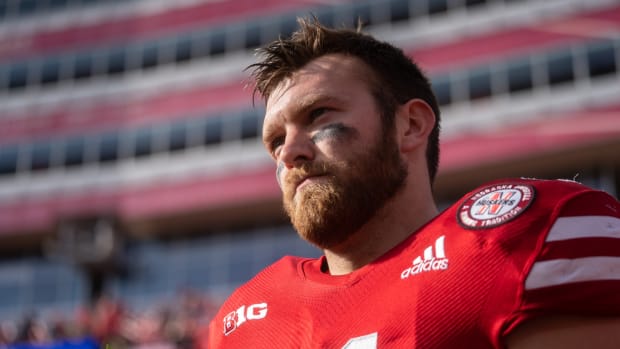 Nov 26, 2021; Lincoln, Nebraska, USA; Nebraska Cornhuskers tight end Austin Allen (11) walks onto the field during the Senior Day ceremony before the game against the Iowa Hawkeyes at Memorial Stadium.