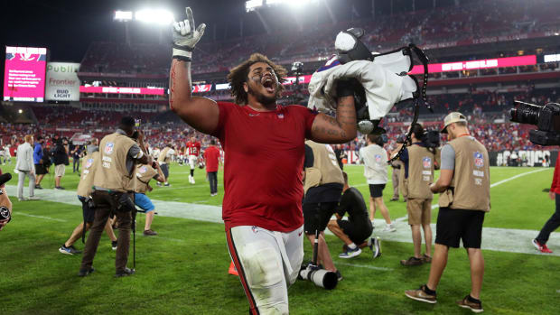 Tampa Bay Buccaneers offensive tackle Tristan Wirfs (78) celebrates as they beat the Buffalo Bills in overtime at Raymond James Stadium.