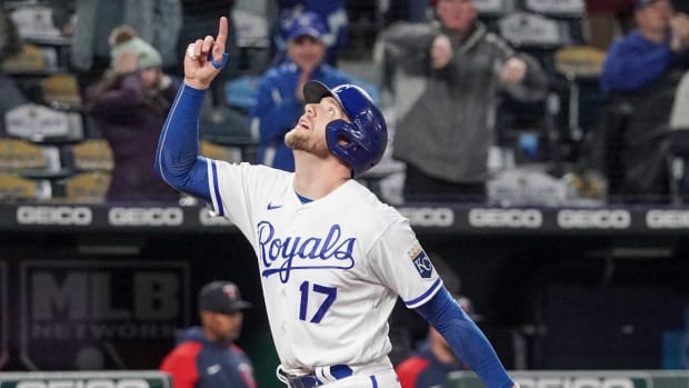 Apr 19, 2022; Kansas City, Missouri, USA; Kansas City Royals first baseman Hunter Dozier (17) celebrates after hitting a home run against the Minnesota Twins in the sixth inning at Kauffman Stadium. Mandatory Credit: Denny Medley-USA TODAY Sports