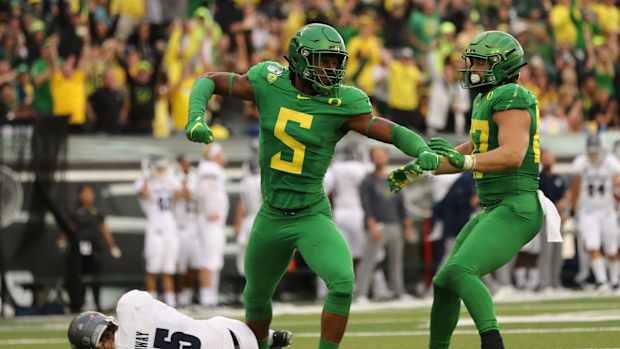 Oregon EDGE Kayvon Thibodeaux celebrates sack
