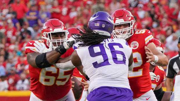 Aug 27, 2021; Kansas City, Missouri, USA; Kansas City Chiefs offensive guard Trey Smith (65) and center Creed Humphrey (52) block Minnesota Vikings defensive tackle Armon Watts (96) during the game at GEHA Field at Arrowhead Stadium. Mandatory Credit: Denny Medley-USA TODAY Sports