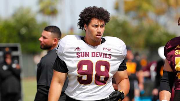 ASU defensive lineman D.J. Davidson (98) warms up during practice in Tempe August 18, 2019.