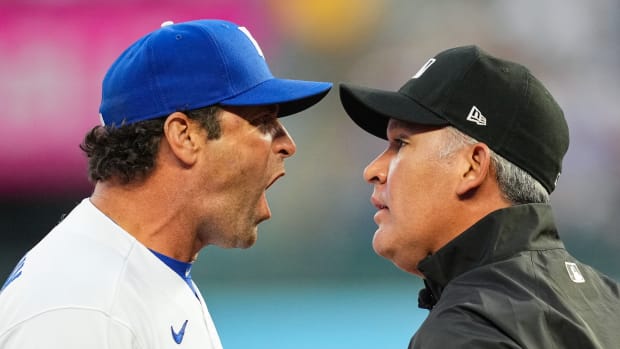 Apr 29, 2022; Kansas City, Missouri, USA; Kansas City Royals manager Mike Matheny (22) argues with umpire Manny Gonzalez (79) during the second inning against the New York Yankees at Kauffman Stadium. Mandatory Credit: Jay Biggerstaff-USA TODAY Sports