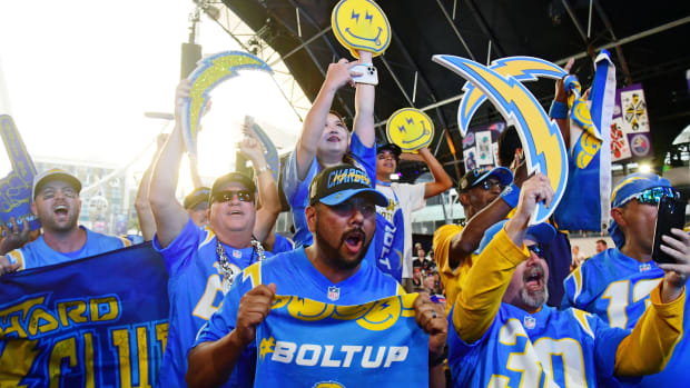 Apr 28, 2022; Las Vegas, NV, USA; Fans react after Boston College guard Zion Johnson was selected as the sixteenth overall pick to the Los Angeles Chargers during the first round of the 2022 NFL Draft at the NFL Draft Theater. Mandatory Credit: Gary Vasquez-USA TODAY Sports