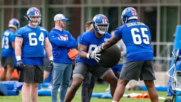 May 13, 2022; East Rutherford, NJ, USA; New York Giants offensive lineman Marcus McKethan (60) practices a drill during rookie camp at Quest Diagnostics Training Center.