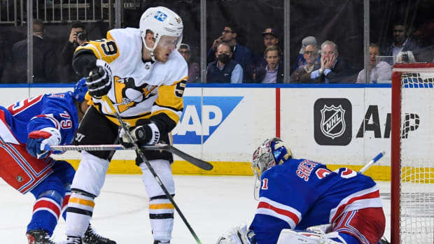 May 11, 2022; New York, New York, USA; New York Rangers goaltender Igor Shesterkin (31) makes a save on Pittsburgh Penguins left wing Jake Guentzel (59) during the third period in game five of the first round of the 2022 Stanley Cup Playoffs at Madison Square Garden. Mandatory Credit: Dennis Schneidler-USA TODAY Sports