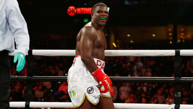 Dec 18, 2021; Tampa, FL, USA; Frank Gore (red gloves) reacts during a fight against Deron Williams (not pictured) at Amalie Arena. Mandatory Credit: Kim Klement-USA TODAY Sports