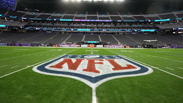The NFL shield logo.