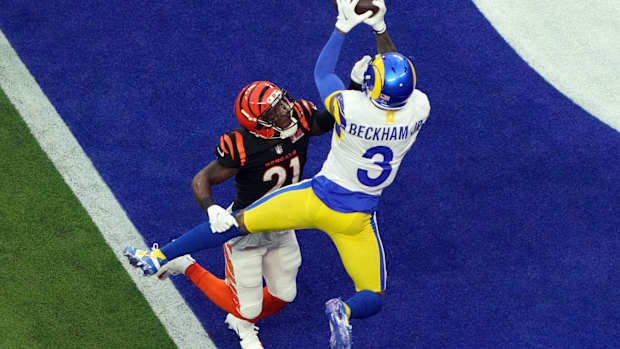 Feb 13, 2022; Inglewood, California, USA; Los Angeles Rams wide receiver Odell Beckham Jr. (3) makes a catch for a touchdown against Cincinnati Bengals wide receiver Ja'Marr Chase (1) in the first quarter in Super Bowl LVI at SoFi Stadium. Mandatory Credit: Kirby Lee-USA TODAY Sports